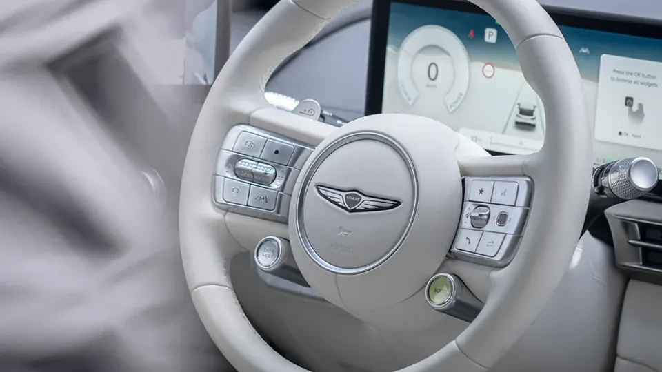 Genesis GV60 Leasing mit Boost-Knopf